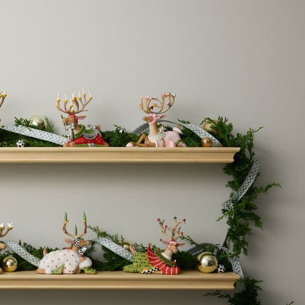 Patience Brewster Dash Away Sitting Cupid Reindeer Figure